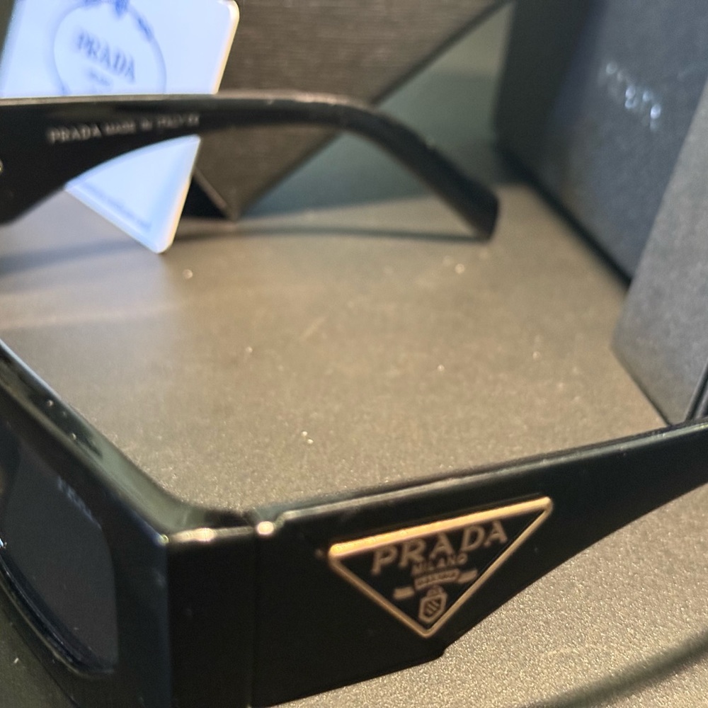 Prada Black Sunglasses with Gold Logo